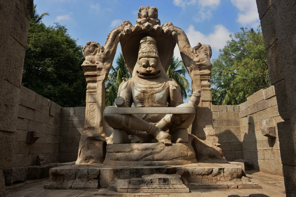 The seated Lakshmi Narasimha stone sculpture in Hampi